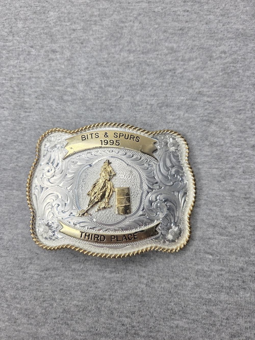 Montana Silversmiths 1995 Bits & Spurs Third Place Barrel Racer Trophy Buckle